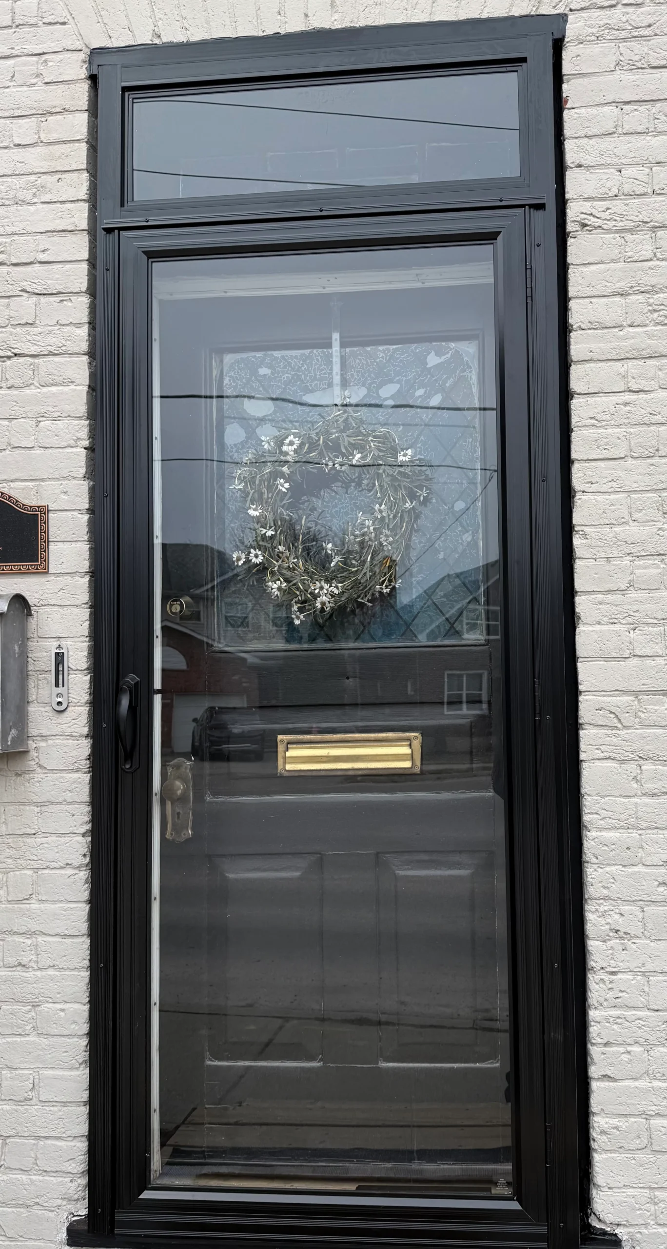 Is it better to repair or replace a storm door in Toronto and the GTA?